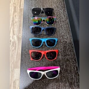 Lot of 6 new plastic sunglasses in various colors.